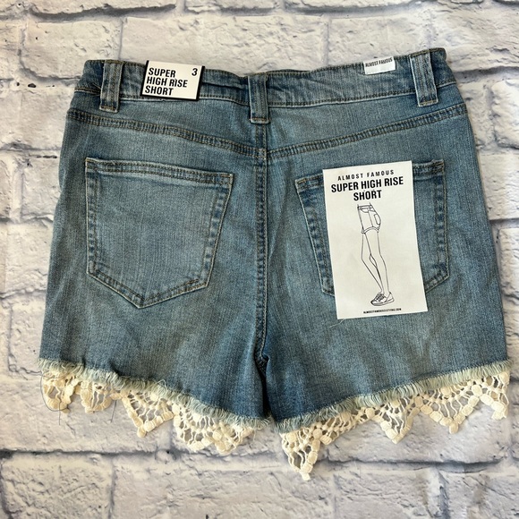 Blue high waisted ripped jeans with floral design size 3 - Picture 2 of 6